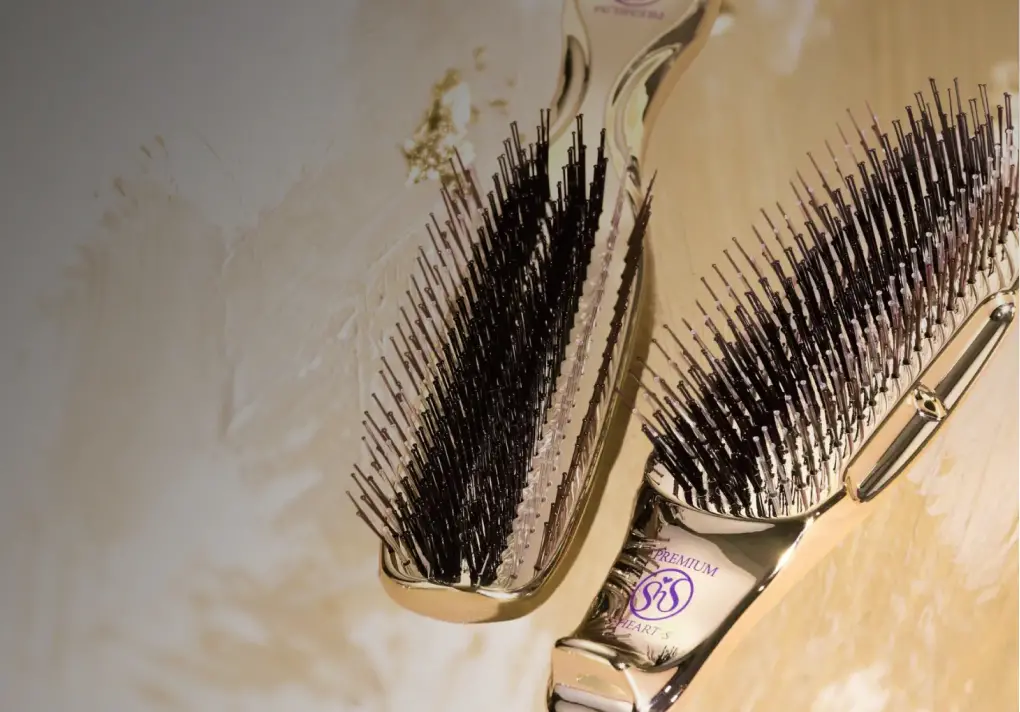 Two brushes on a glossy surface